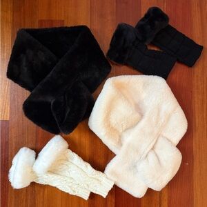 Set of black and white faux fur scarves with matching wrist cuffs.